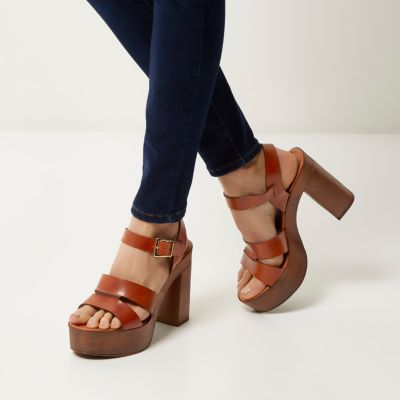 Brown leather heeled platforms